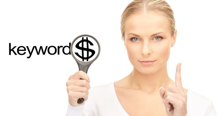 22521319_l- business and seo concept - woman with magnifying glass and keywords word